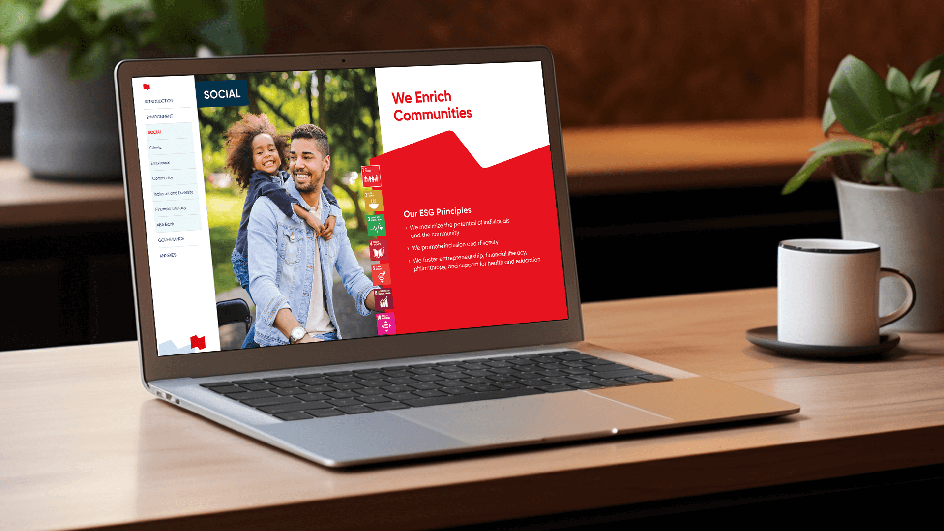 A page of the National Bank ESG report displayed on a laptop, emphasizing the social impact.