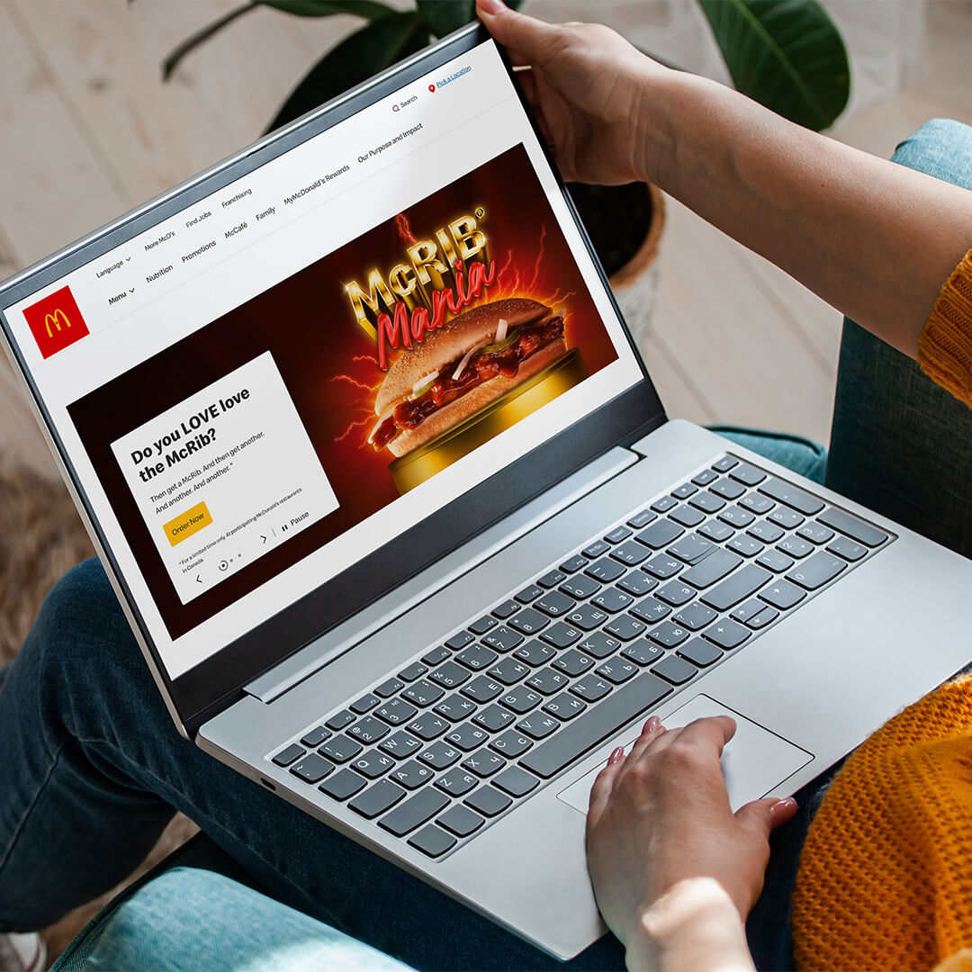 McDonald’s McRib Mania campaign displayed on a laptop website page.