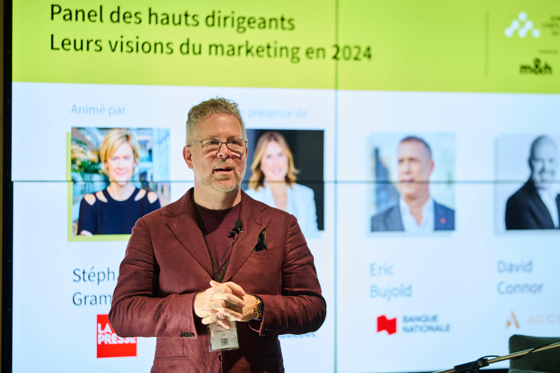 Christian Quenneville (m&h) addressing the audience at the Sommet des chefs du marketing