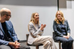 Photo of Nuno Bamberg, Christina Litz, and Jessica Gale seated on stage at the C-Suite Marketing Summit, engaged in discussion.