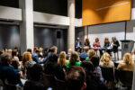 On-stage panel featuring Diane J. Brisebois, Vanda Provato, Anna Martini, David Lui, and Simone Lumsden.